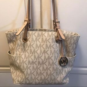 Cream colored Michael Kors Purse